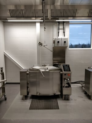 A mixer kettle located rightfully in the kitchen.