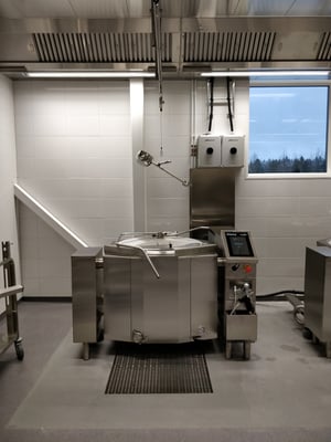 A mixer kettle located rightfully in the kitchen.