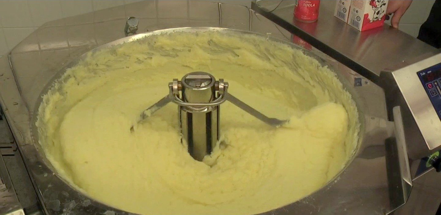 Mashed potatoes ready in mixer kettle.